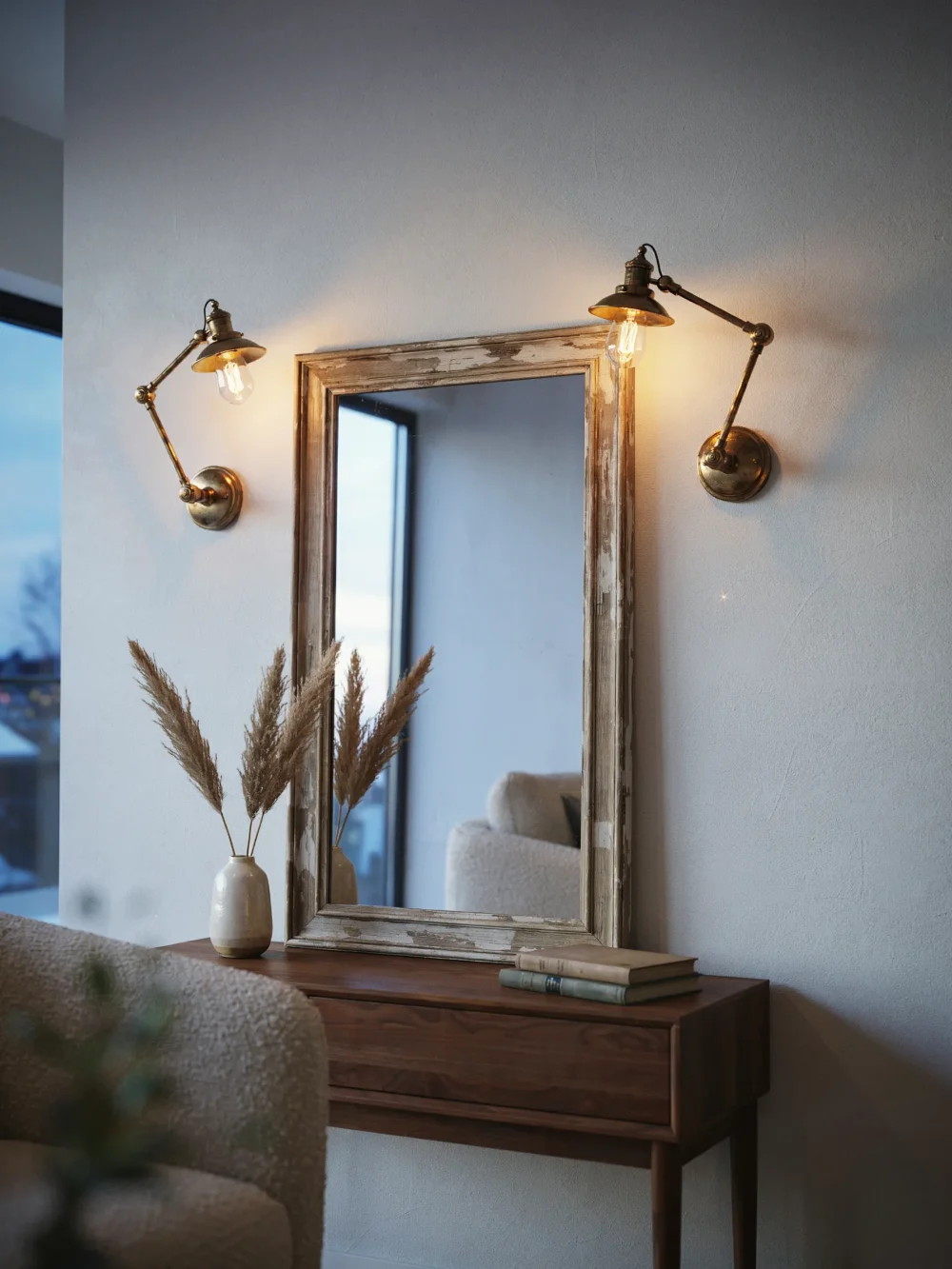 Swing Arm Sconces Framing a Large Mirror
