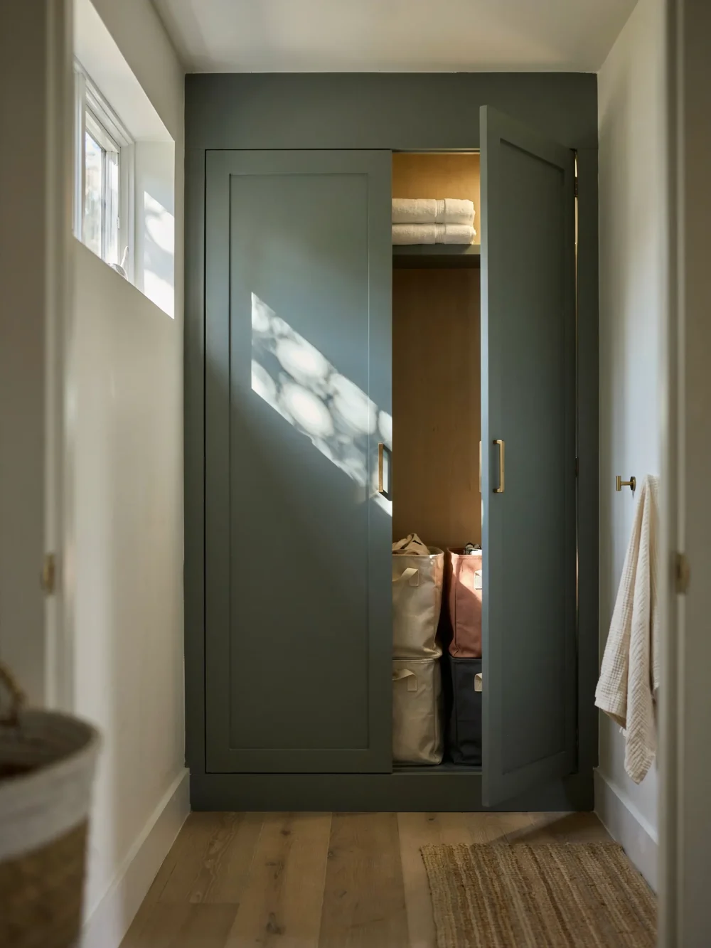Integrated Sorting Hampers Behind Pocket Doors
