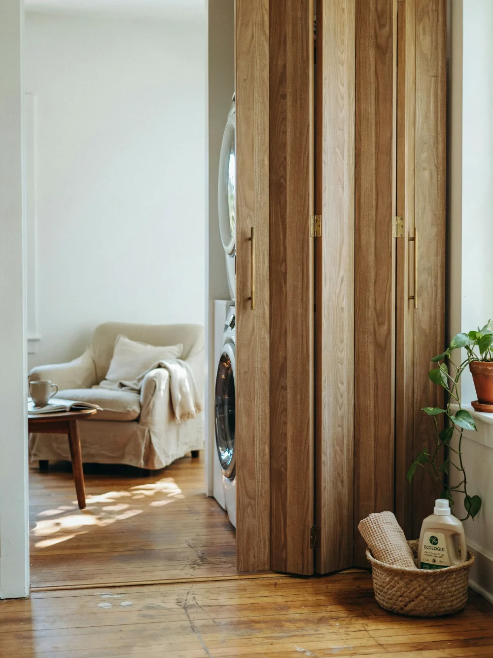 Sleek Folding Panel Doors Over Front-Loaders