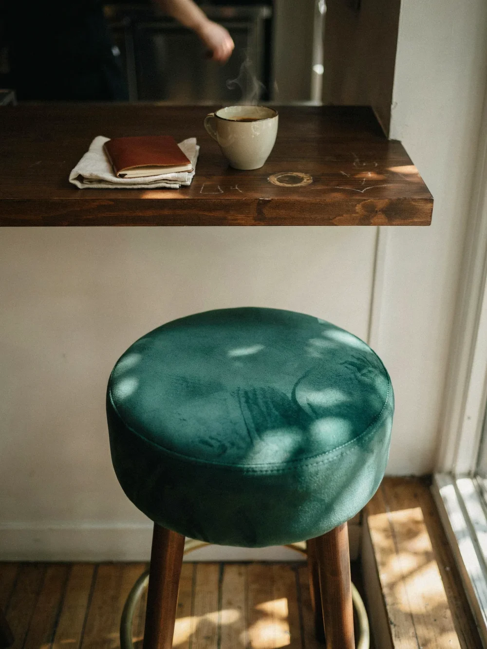Velvet Upholstered Stool at the Bar Counter